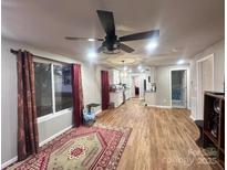 Bright living room with hardwood floors and access to kitchen at 1210 Butler St, Salisbury, NC 28144