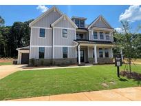 Beautifully designed new construction home with a well-manicured lawn and inviting curb appeal at 2007 Kendall Dr # 6, Wesley Chapel, NC 28173