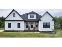 Charming new construction home featuring white siding, black trim and roof, and a welcoming front porch at 1215 Coppergate Dr, Salisbury, NC 28147