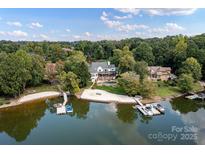 Luxury waterfront home with private beach, dock, and stunning lake views at 19100 Mary Ardrey Cir, Cornelius, NC 28031