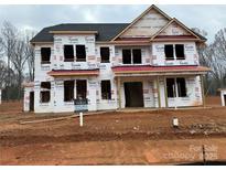 Two-story house with gray roof and red accents, currently under construction at 2003 Kendall Dr # 5, Wesley Chapel, NC 28173