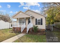 Charming one-story house with a front porch and brick accents at 116 E Maryland Ave, Bessemer City, NC 28016