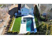 Aerial view of house with pool and backyard at 19935 Wooden Tee Dr, Davidson, NC 28036