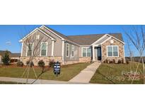 Two-story house with stone accents and a landscaped lawn at 1858 Yardley St, Rock Hill, SC 29732