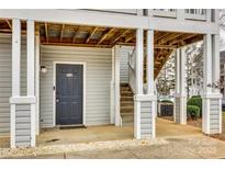 Condo exterior with private entrance, stairs, and covered porch at 37 Hamiltons Harbor Dr # 601, Clover, SC 29710