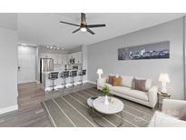 Inviting living space with sleek kitchen island, modern finishes, and city view decor at 1315 East Blvd # 433, Charlotte, NC 28203