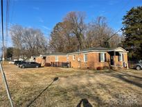 Brick triplex with ample parking and a spacious yard at 1902 Catherine Simmons Ave # 30, Charlotte, NC 28216