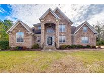 Brick two-story house with a large front yard at 2420 Valelake Rd, York, SC 29745