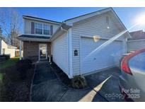 Inviting exterior of a two-story house with a two-car garage and a well-maintained front yard at 1668 Sandpiper Dr, Rock Hill, SC 29732