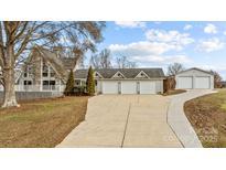 A-frame home with three-car garage and detached workshop at 9175 Cox Rd, Mount Pleasant, NC 28124