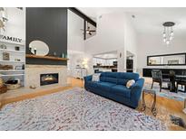 Open living area with fireplace and view of dining area at 204 Riverview Ter, Lake Wylie, SC 29710