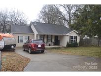 Cute ranch home with carport and spacious yard at 1507 Hollyleaf Ave, Gastonia, NC 28052
