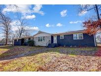 Ranch style home with brick and stone accents at 126 Oakley Dr, Harrisburg, NC 28075