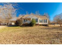 One-story house with carport and a spacious yard at 4641 Hickory Grove Rd, Sharon, SC 29742