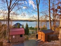 Scenic lakefront property with two storage sheds at 119 River Ridge Trl # E175/176, Mount Gilead, NC 27306