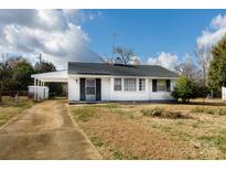 Ranch style home with carport and mature landscaping at 1239 Bose Ave, Rock Hill, SC 29732