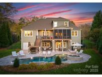 Stunning home with pool and patio, perfect for outdoor entertaining at 7542 Waterview Dr, Cornelius, NC 28031