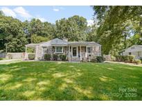 Stone and shingle charming ranch home with large yard at 2830 Royston Rd, Charlotte, NC 28208