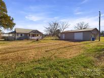 Ranch home with detached garage and spacious yard at 117 Mardon Ln, Statesville, NC 28677