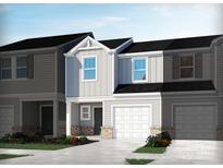 Two-story townhome with a one-car garage, gray siding, and a welcoming front entrance at 1608 Village Grove Ln, Monroe, NC 28110