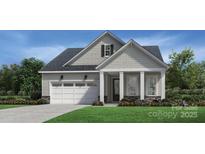 One-story home with shingle siding, white garage door, and landscaping at 3726 Blue Pine Dr # 3, Indian Land, SC 29707