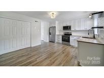 Modern kitchen with stainless steel appliances and wood countertops at 438 Stoneycreek Ln, Rock Hill, SC 29730