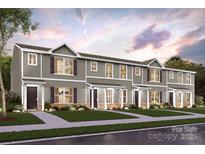 Modern three-unit townhome building with gray siding and landscaping at 2226 Cranberry Way, Salisbury, NC 28147