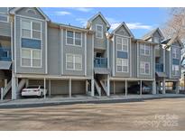 Front view of townhouses with parking at 513 N Graham St # 1B, Charlotte, NC 28202