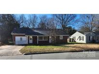 Brick ranch home with a ramp and carport at 835 Maple Ave, Salisbury, NC 28144