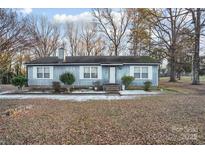 Ranch style home with a spacious yard at 12016 Ramah Church Rd, Huntersville, NC 28078