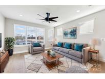 Spacious living room with city views and comfortable furnishings at 1927 W Trade St, Charlotte, NC 28216