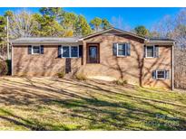 Brick ranch house with a large yard and mature trees at 4193 Walker Rd, Rock Hill, SC 29730