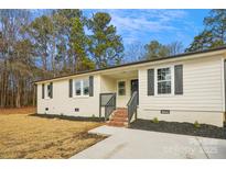 Charming ranch home with updated exterior and landscaping at 1105 Stanback Rd, Chester, SC 29706