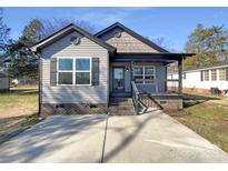 Gray house with a black roof, steps, and porch at 1324 Crawford Rd # 6, Rock Hill, SC 29730
