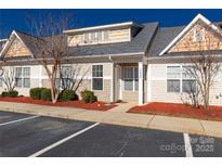 Inviting exterior of a charming townhome with well-maintained landscaping at 2025 Shady Pond Dr, Lake Wylie, SC 29710