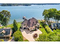Luxury waterfront home with expansive lake views and private dock at 132 Rollingwood Ln, Mooresville, NC 28117