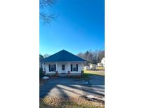 Charming one-story home with a spacious yard and detached shed at 2805 N Main St, Kannapolis, NC 28081