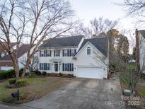 Two-story house with attached garage and mature trees at 117 Biscayne Ct, Mooresville, NC 28117