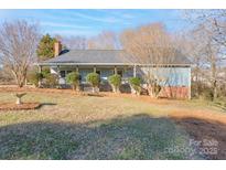 Ranch home with front porch and landscaped yard at 1652 Brook Dr, Fort Mill, SC 29708