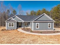 Gray exterior house with white trim, landscaping, and a curved walkway at 2572 Maiden-Salem Road Maiden Salem Rd # 4, Lincolnton, NC 28092