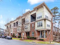 Modern brick townhome with multiple levels and balconies at 3551 Spencer St, Charlotte, NC 28205