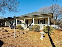 Charming house with front porch and landscaped yard at 503 E 10Th St, Kannapolis, NC 28083