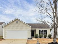 Charming one-story house with a large yard and a two-car garage at 6603 Wandering Creek Dr, Charlotte, NC 28216