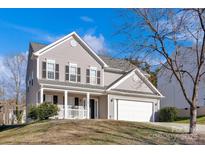 Two-story house with gray siding, white trim, and a two-car garage at 9150 Austin Ridge Ln, Charlotte, NC 28214