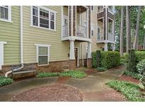 Exterior of charming townhome with walkway and landscaping at 1733-C Matheson Ave, Charlotte, NC 28205