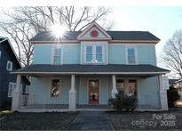 Charming two-story house with a wrap-around porch at 507 Park Ave, Salisbury, NC 28144