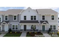Charming townhome showcasing craftsman-style architecture and a welcoming front porch at 205 Cliffwood Nw St # B-2, Concord, NC 28027