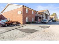 Brick apartment building with ample parking and landscaping at 2146 S Main St, Kannapolis, NC 28081