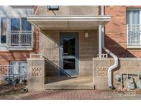 Brick building entrance with a covered entryway and address numbers at 3649 Warp St, Charlotte, NC 28205