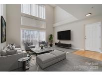 Spacious living room with high ceilings and lots of natural light at 3649 Warp St, Charlotte, NC 28205